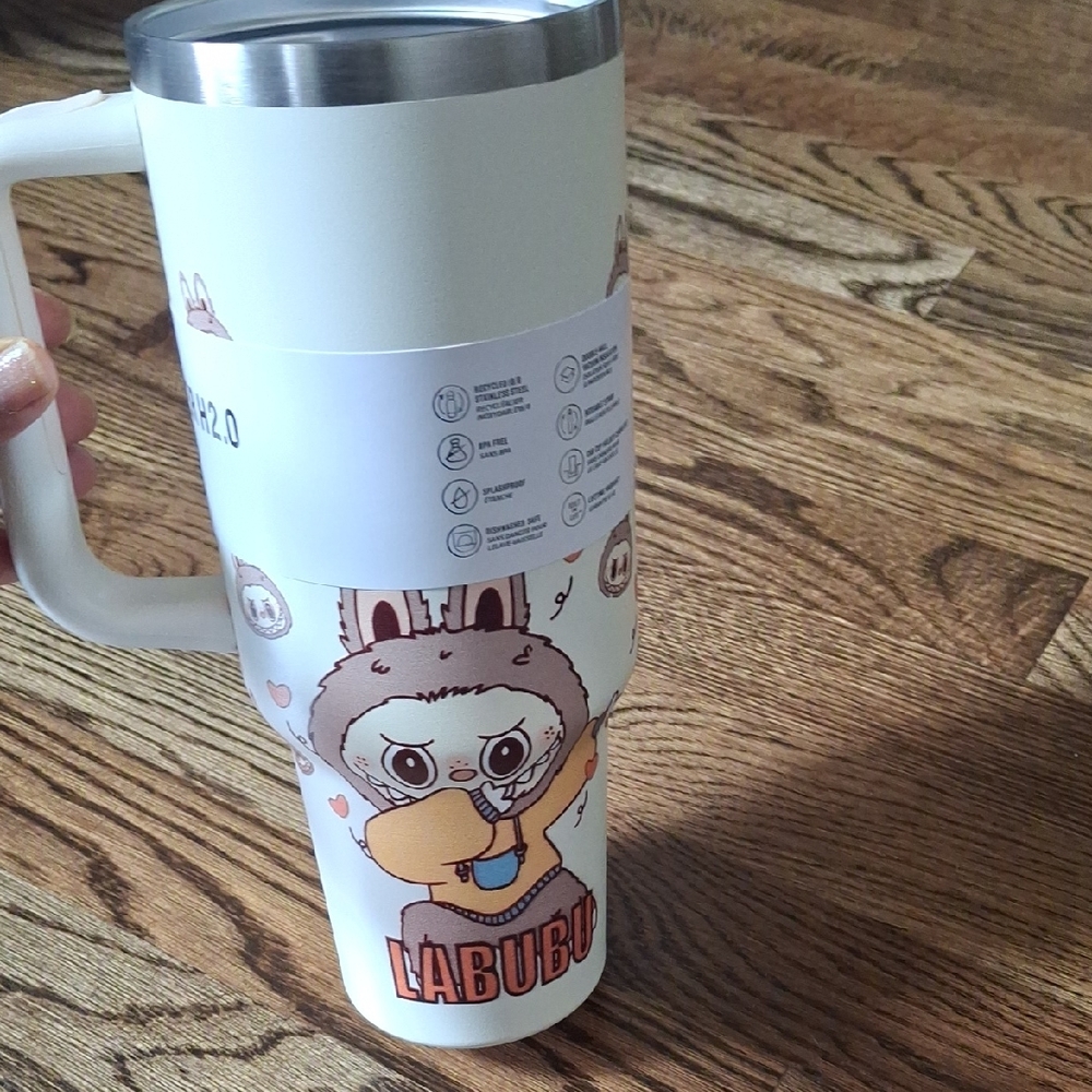 Cream Colored Tumbler With Character Print